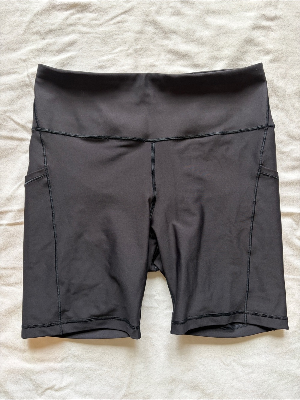 Athleta Black High-Rise Bike Shorts with Side Pockets